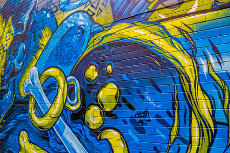 MELBOURNE, AUSTRALIA - MARCH 21, 2015: Colorful graffiti detail in back alley of downtown.のeditorial素材