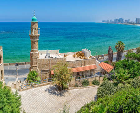 Morning panorama with the Al-Bahr Mosque in Jaffa with view of the beach, Tel Aviv riviera and hotels in distant, Israel.の写真素材