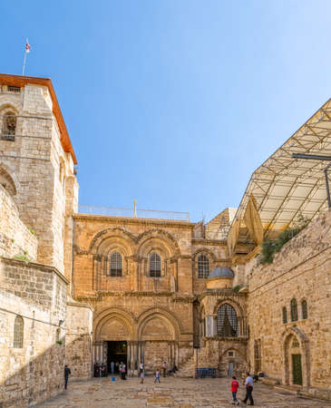 JERUSALEM, ISRAEL - JUNE 19, 2015: Tourists and pilgrims at the atrium of the Church of the Holy Sepulchre, holiest Christian site in the world.のeditorial素材