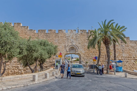 JERUSALEM, ISRAEL - JUNE 19, 2015: People at the Dung Gate, one of the gates in the walls of the Old...