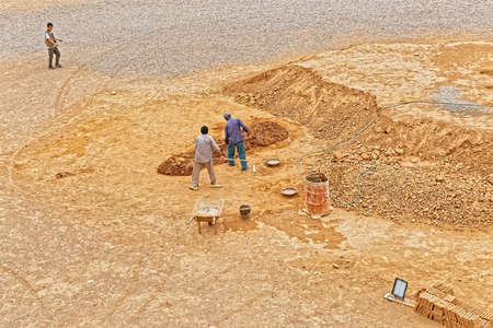 MEYBOD, IRAN - MAY 6, 2015: Working place for making mud bricks at the ruined Narin castle.のeditorial素材