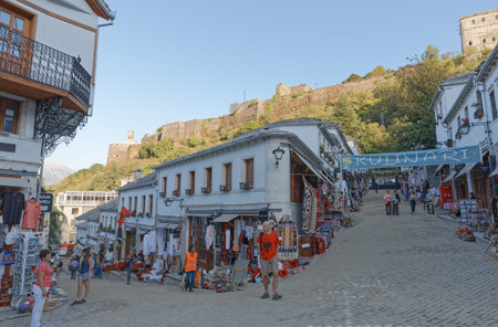 GJIROKASTER, ALBANIA - SEPTEMBER 29, 2019: People enjoying the peaceful atmosphere in quarters of...
