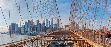 Manhattan through the Brooklyn Bridge cables in New Yorkのeditorial素材