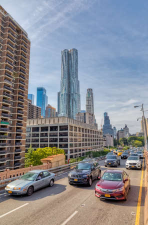 Traffic at the entrance to the Brooklyn Bridge in New Yorkのeditorial素材