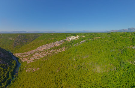 Drone aerial view of the archaeological remains of the medieval fort Necven, located on the west...