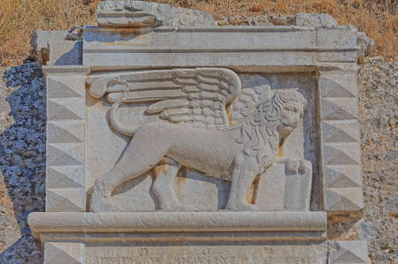 Lion of Saint Mark New fortress wall detail in Corfu Greeceの写真素材