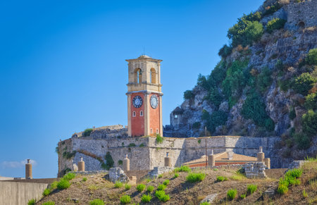 Old clock tower at Venetian fortress in Corfu town Greeceの写真素材