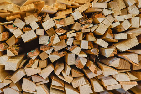 Stacked wood in the sawmill close upの写真素材