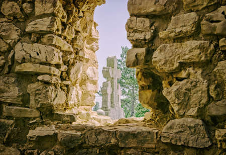 Old tombstones by the church ruinの写真素材