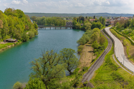 Railway line by the river Kupa, Ozaljの写真素材
