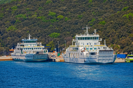 Anchored ferries in Brestova port, Istria Croatiaのeditorial素材
