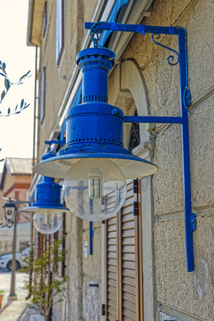Blue electric lamps at the old house in Cres town portのeditorial素材
