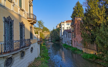 Charming Medieval Canal Scene in Padua Italyの写真素材