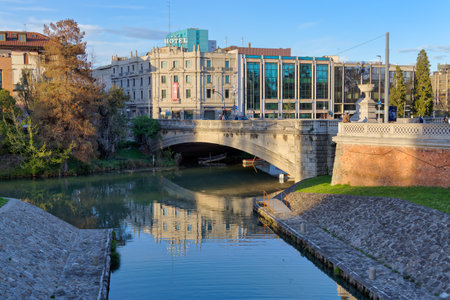Ponte del Popolo and Giuseppe Garibaldi Street in Padua Italyのeditorial素材