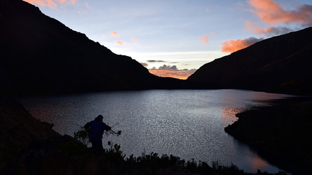 El Cajas National Park Nature Lake sunset human silhoutteの写真素材