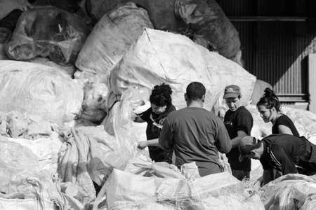 Argentina, Lomas of Zamora. June 2019. Informal workers perform sorting of recyclable materials in the municipal ecopoint.のeditorial素材