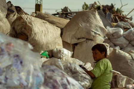 Argentina, Lomas of Zamora. June 2019. Informal workers perform sorting of recyclable materials in...