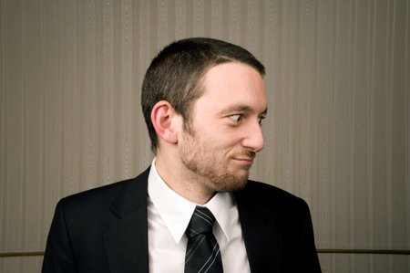 man in suit expresses doubt