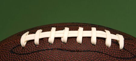 An American football with colse up on lacesの写真素材
