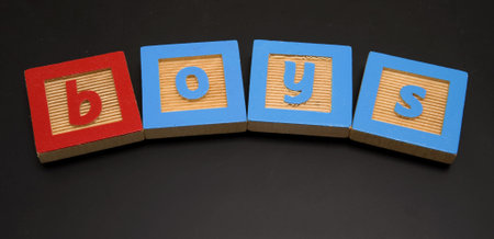 Word written on childs chalkboard with colorful blocksの写真素材