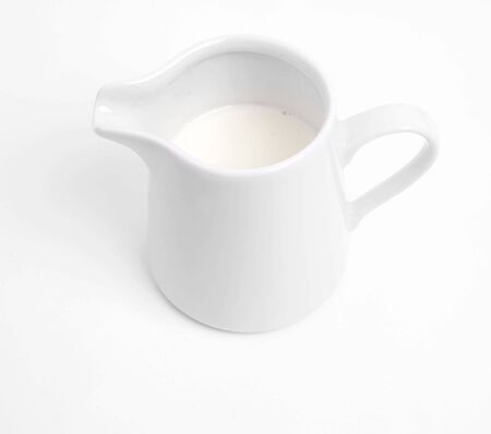 milk jug on white backgroundの写真素材