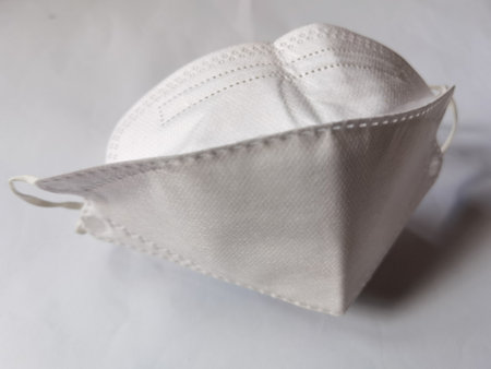 KF94 medical mask to prevent   on a white backgroundの写真素材