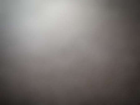 black and gray abstract background with reflection in the middle for illustrationの写真素材