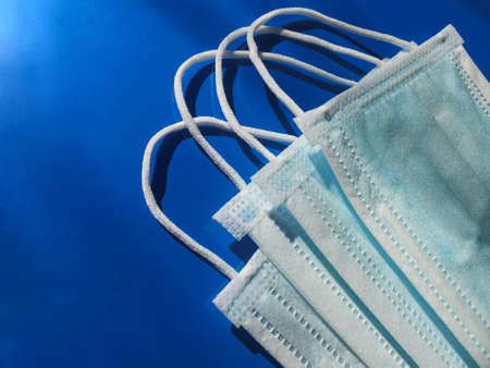 medical mask on blue backgroundの写真素材