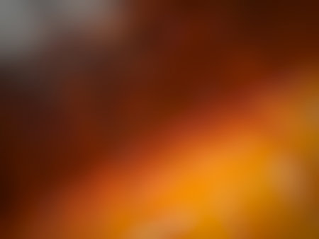 Orange brown gradient soft blurred background illustration for presentation product placement and other designsの写真素材