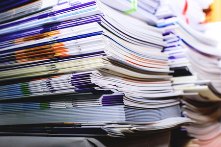 Pile of documents on the desk in office. Business concept.の写真素材