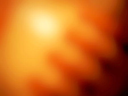 abstract orange background with bokeh defocused lights and shadowの写真素材