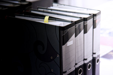 Office folders with papers and documents in the office. Office bindersの写真素材