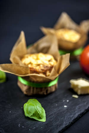 cheese muffin sliced ??fresh tomato, cheese and basilの写真素材