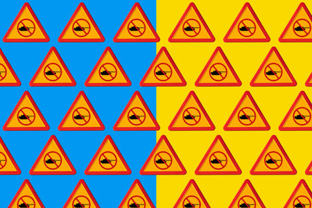 Danger traffic sign pattern with a military tank with the forbidden symbol with the yellow and blue...