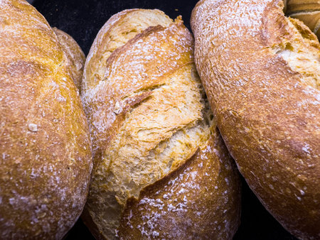 Assorted pieces of bread in a basket. Concept of bakery, artisanal, preparation, wheat, gluten-free,...