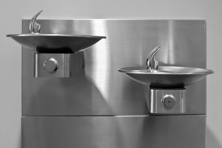 Two Stainless Steel Drinking Fountains, front view 