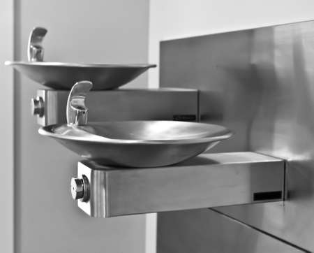 Two Stainless Steel Drinking Fountains, side viewの写真素材