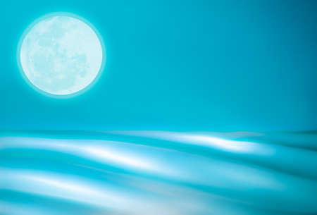 Artistic, abstract background of a full moon over the ocean の写真素材