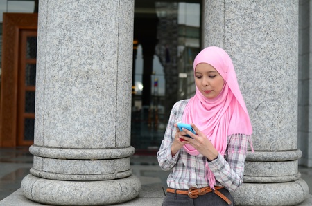Young asian muslim woman in head scarf の写真素材
