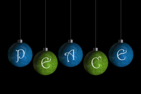 green and blue ornaments that spell peaceの写真素材