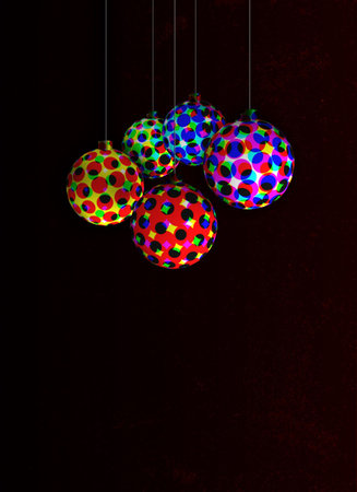 ornaments with colorful halftone patterns on a dark backgroundの写真素材