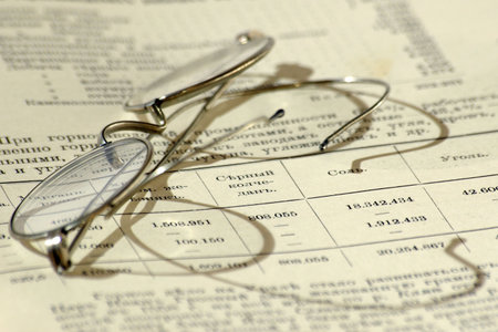 Old book with glassesの写真素材