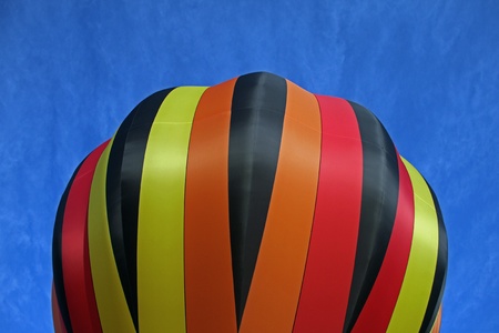 Yellow red black striped balloonの写真素材