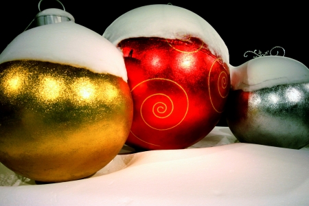 Snow covered Christmas decorationsの写真素材