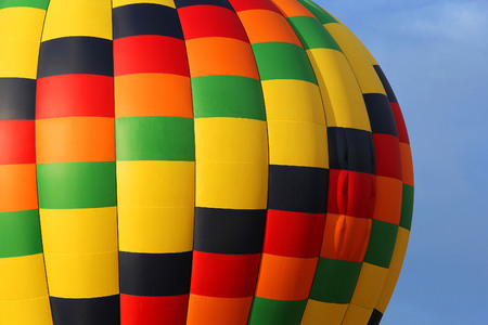 Close-up view of a colourful hot-air balloon to use as backgroundの写真素材