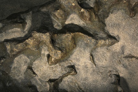 Sand texture from receiding water on a tropical beachの写真素材