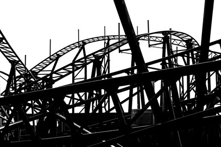 Silhouette roller coaster tracks on a white bacgroundの写真素材