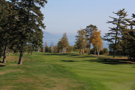 Scenic golf holes in the fall season with panoramic viewの写真素材