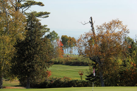 Scenic golf holes in the fall season with panoramic viewの写真素材
