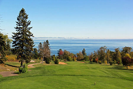 Scenic golf holes in the fall season with panoramic viewの写真素材